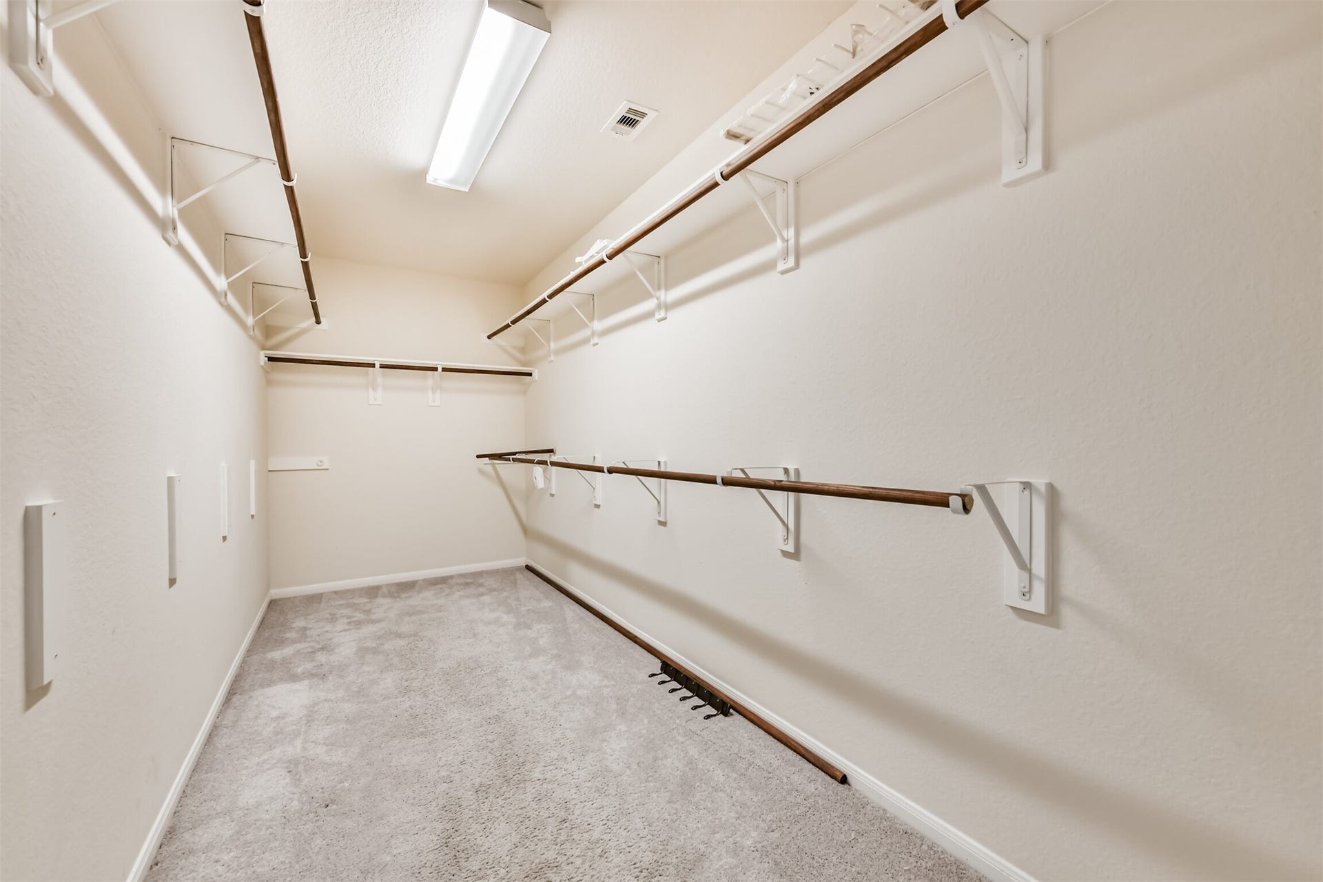 2811 Afton Drive, Pearland, TX 77581 Spacious walk-in closet with ample storage for all your wardrobe needs.