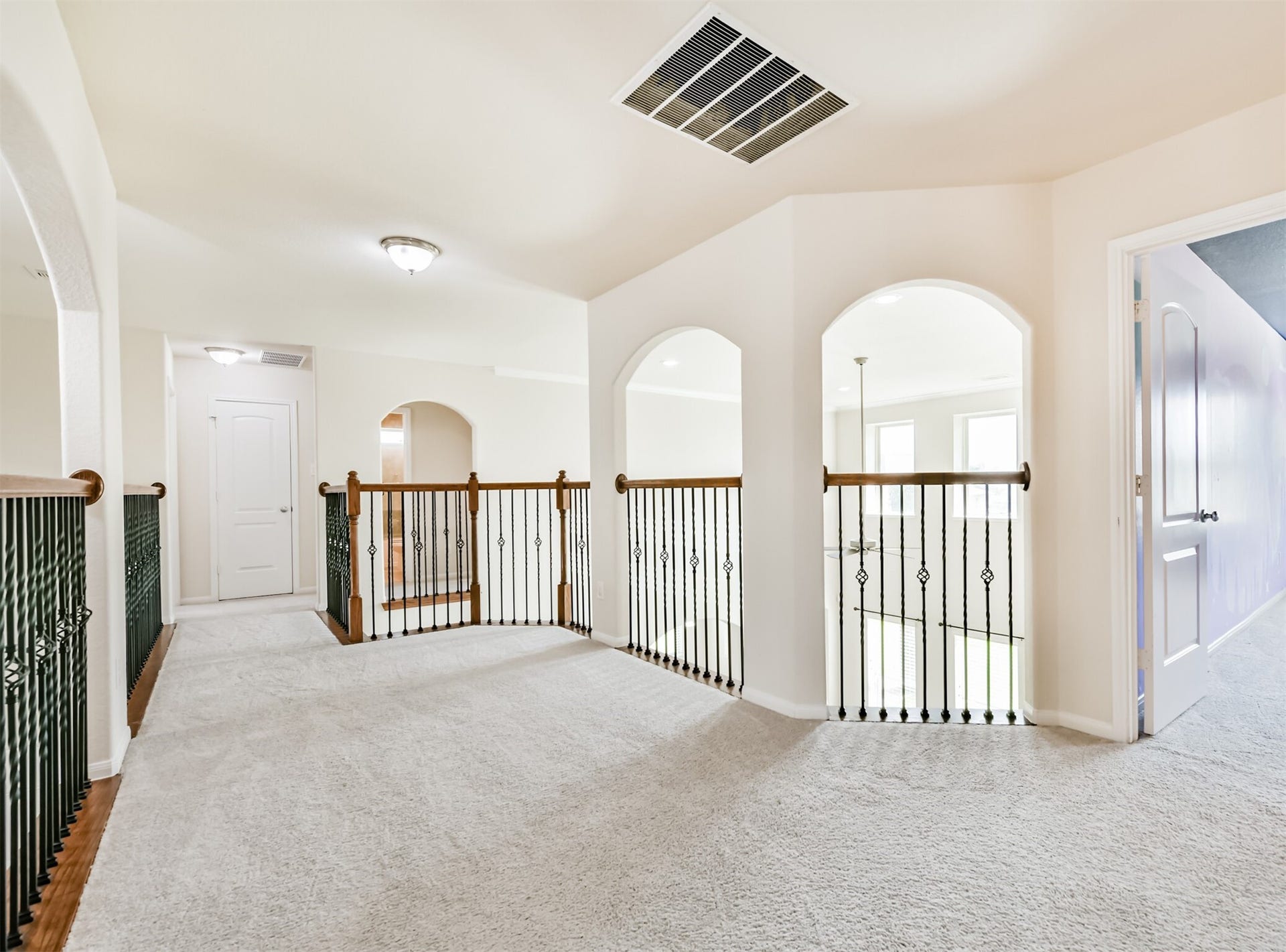 2811 Afton Drive, Pearland, TX 77581 Bright and spacious upstairs landing, perfect for a cozy reading nook or additional seating area.