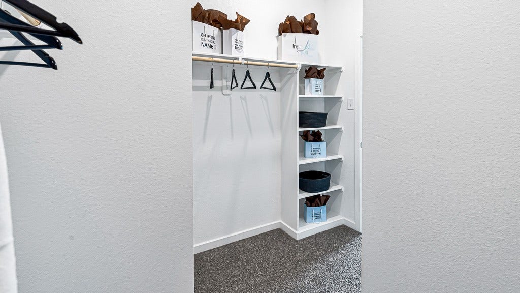 7338 Grand Mason Drive, Cypress, TX 77433 Spacious walk-in closet in primary suite.