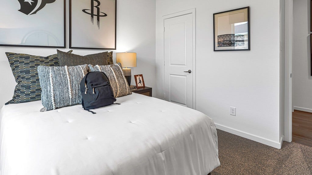7338 Grand Mason Drive, Cypress, TX 77433 Bedroom 4 has a walk-in closet.