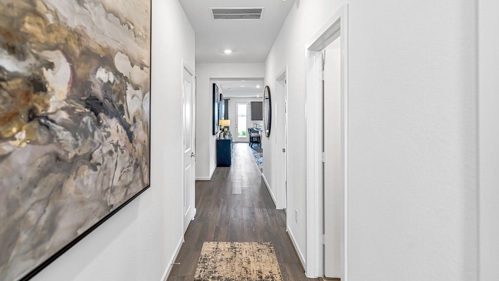 7338 Grand Mason Drive, Cypress, TX 77433 As you enter the sightline extends to back of home for and inviting ambiance.