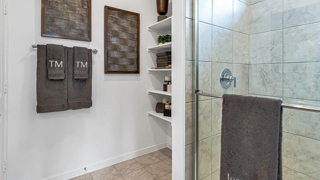 7338 Grand Mason Drive, Cypress, TX 77433 Recessed open shelves are perfect for towels, storage and decor.