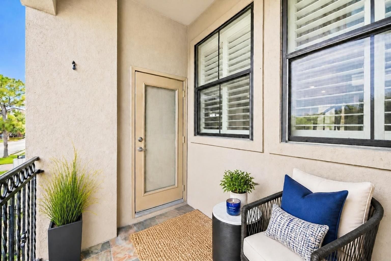 2604 Chenevert Street, Houston, TX 77004 The second story balcony off the living room offers a quiet space for relaxation - Virtually staged