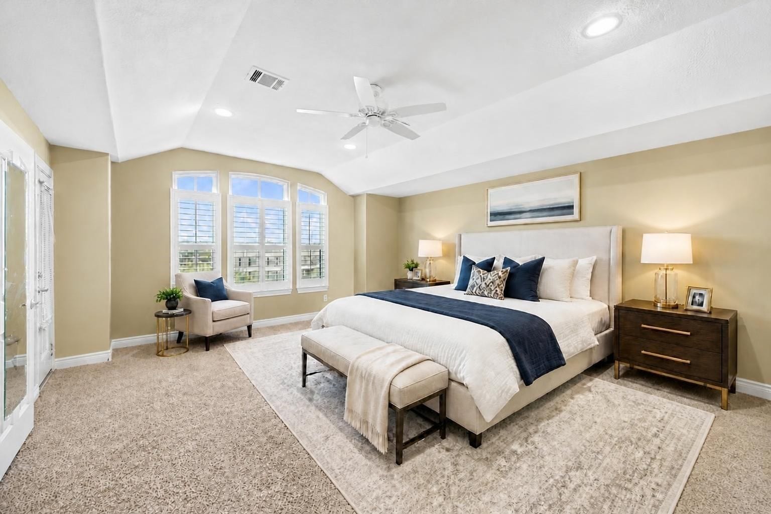 2604 Chenevert Street, Houston, TX 77004 The primary bedroom is the star of this home! The large windows let in plenty of natural light. With two walk-in closets and a luxurious en-sutie bath you'll enjoy the night in this home! - Virtually staged