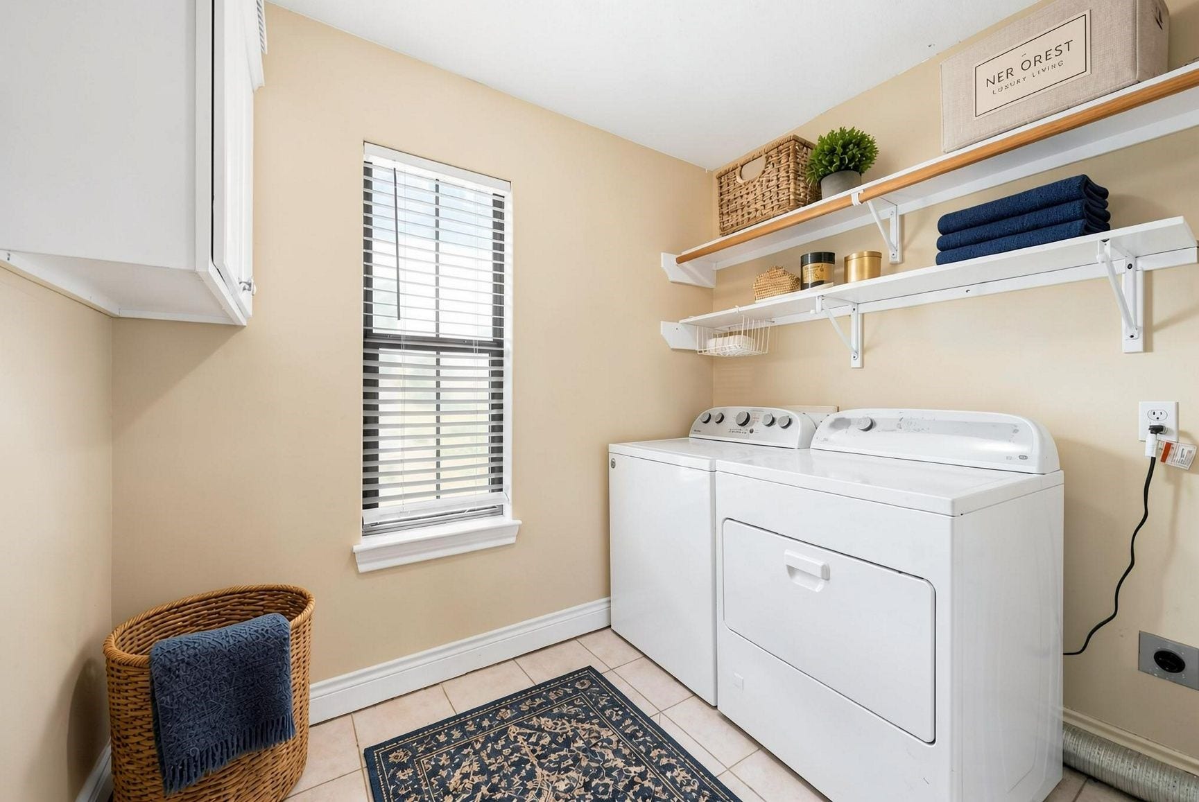 2604 Chenevert Street, Houston, TX 77004 Utility room located on the third loor with shelving and storage cabinets - Virtually staged
