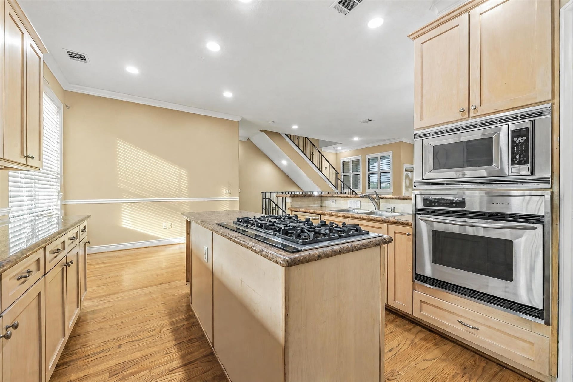 2604 Chenevert Street, Houston, TX 77004 The island adds even more counter space with a gas cooktop
