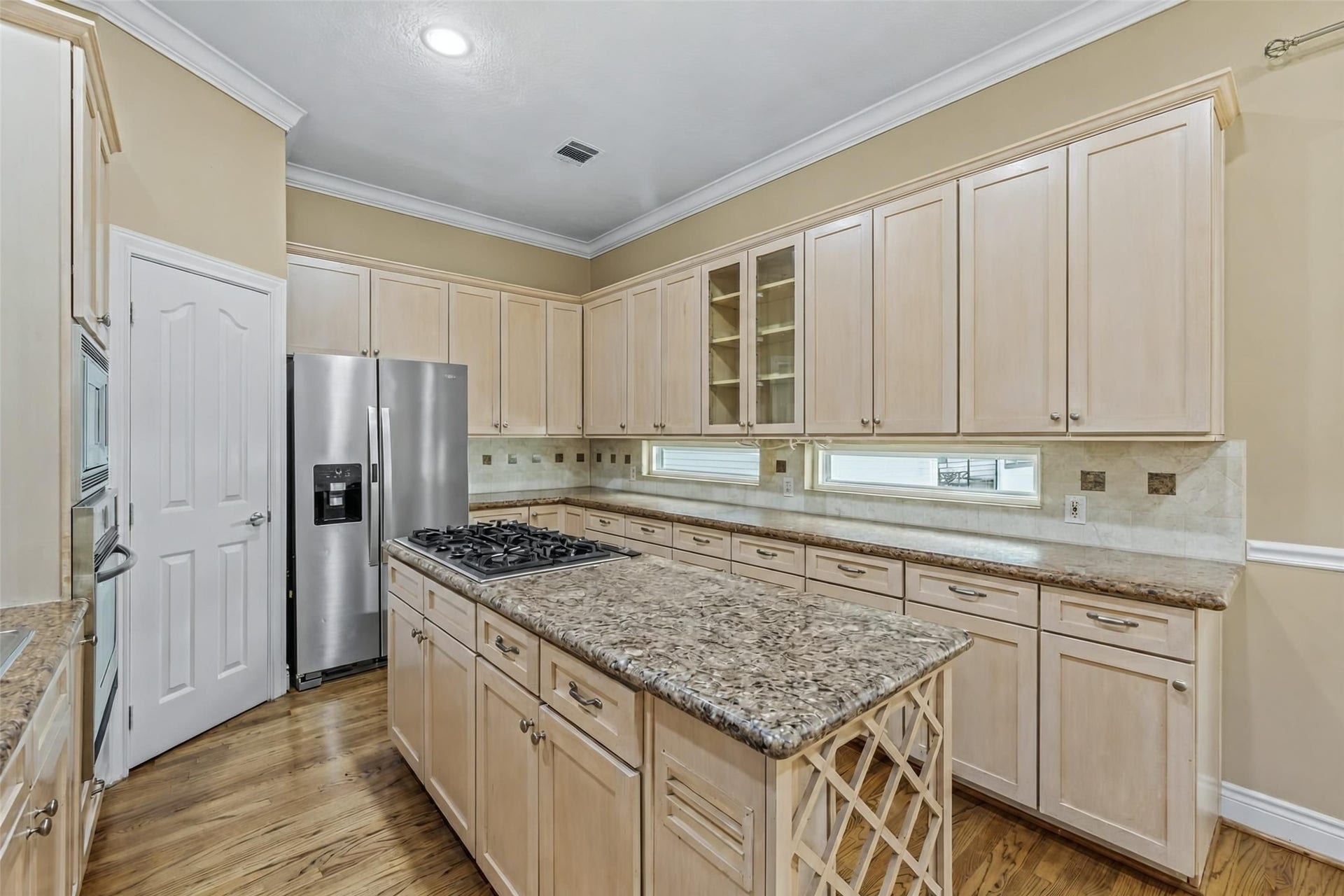 2604 Chenevert Street, Houston, TX 77004 Enjoy cooking in this massive kitchen! Built for family dining or entertaining guests, you'll never run out of space!