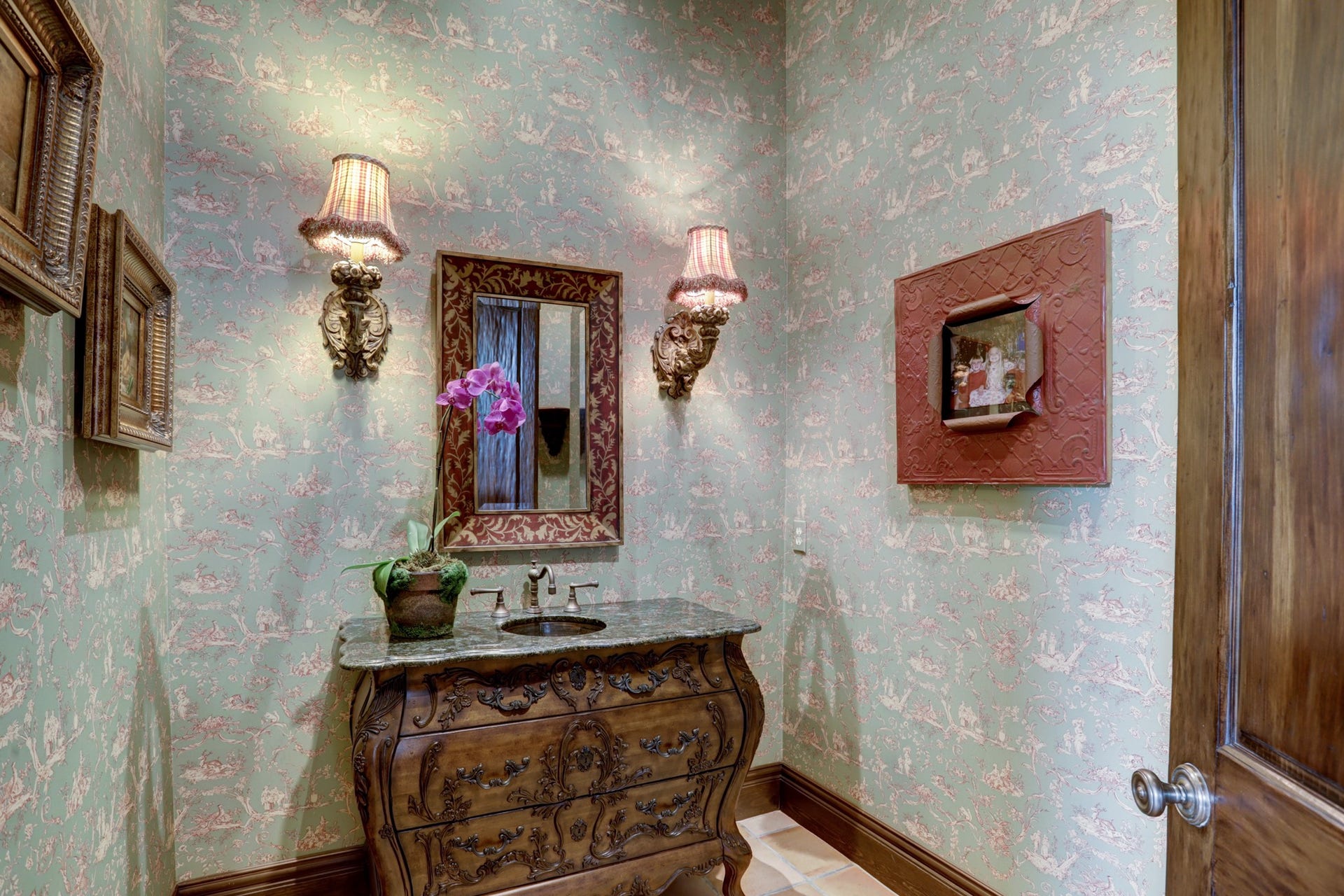 36 Saddlebrook Court, Tomball, TX 77375 One of the first floor powder baths with custom wall coverings, custom vanity and antique sconces.