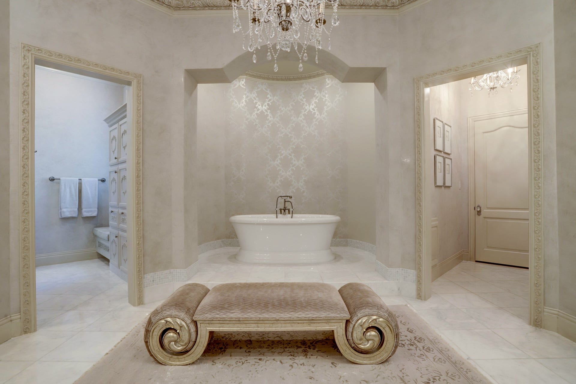 36 Saddlebrook Court, Tomball, TX 77375 Immerse yourself in spa-like luxury and timeless elegance. Custom wall coverings, fixtures, and lighting elevate every detail, while the serene soaking tub offers ultimate relaxation.