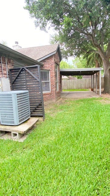 2216 Westminister Street, Pearland, TX 77581 Another view of spacious backyard and covered patio