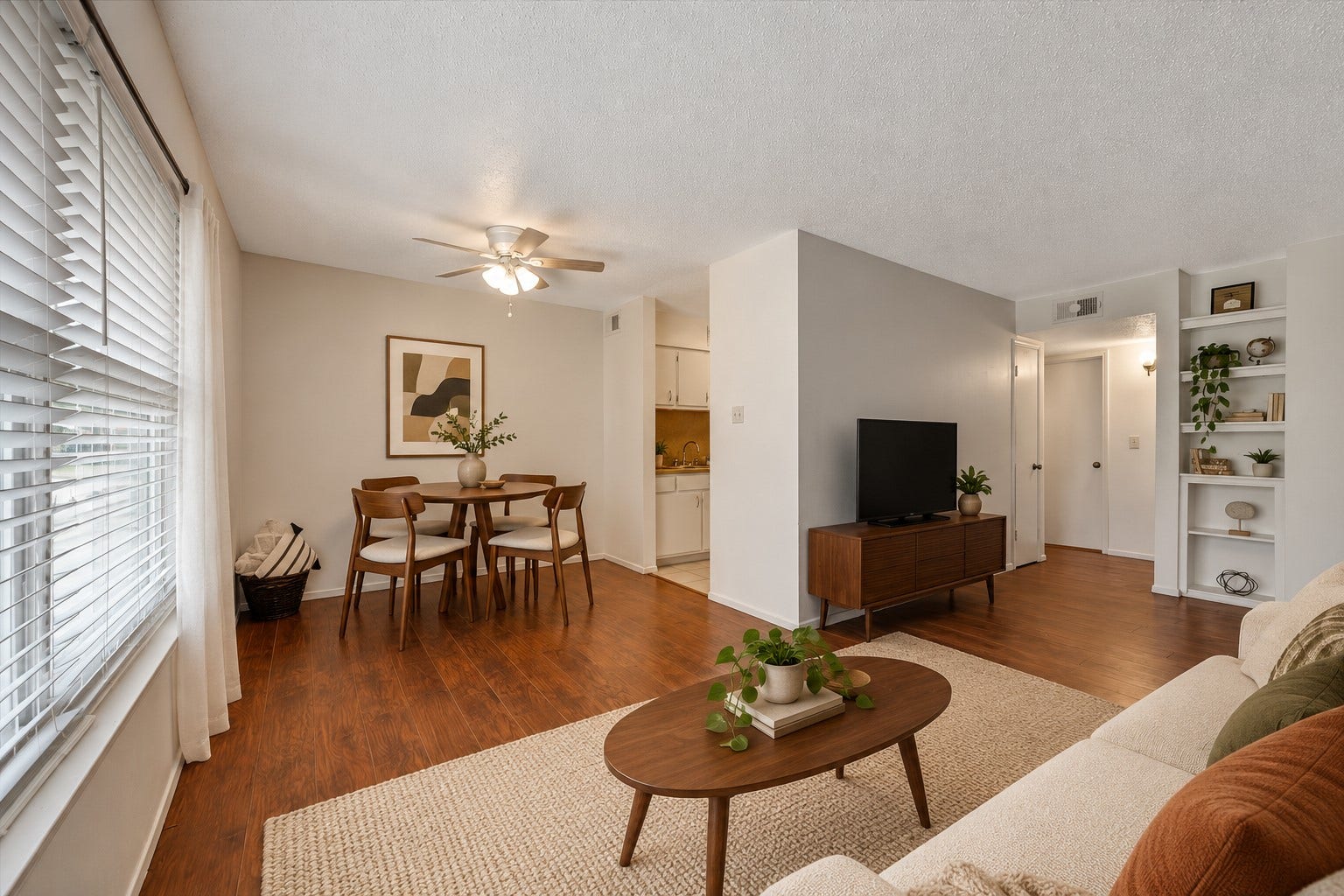 Bright and welcoming living and dining areas filled with natural light! Virtually staged.