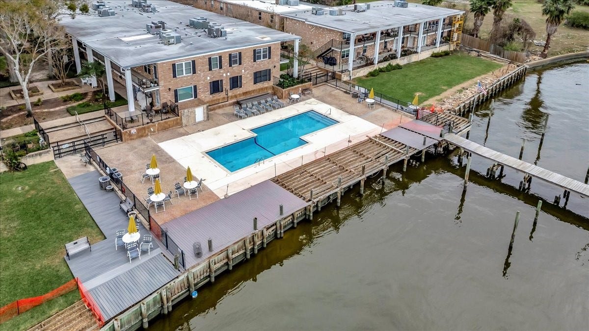 Relax by the saltwater pool with fantastic views of the surrounding waterfront and enjoy all this community has to offer.