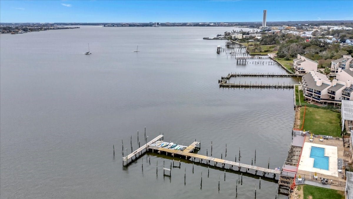 Located at the back of the property, the pier and surrounding lake views offer a serene escape right within the community.