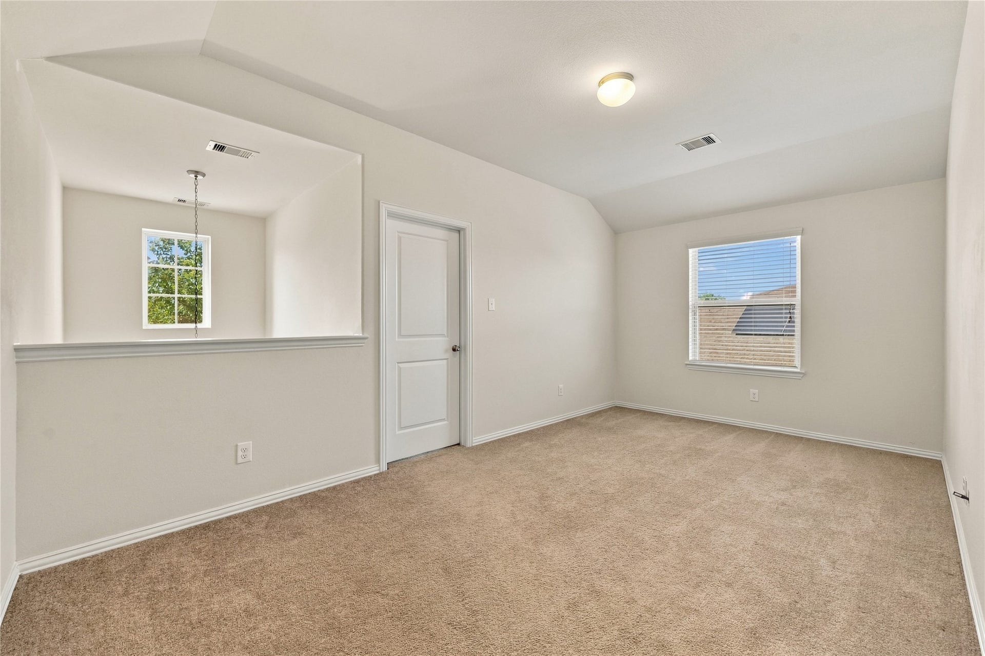 Spacious flex room leading to first upstairs bedroom, let your creativity run wild!