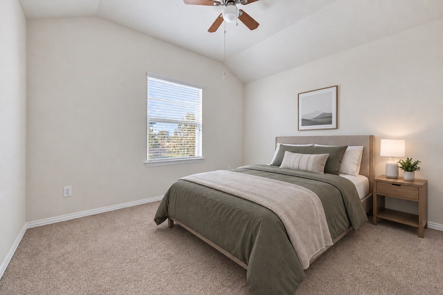First upstairs bedroom, overlooking the front of the home, styled with simple cozy decor! 
*Virtually staged.*