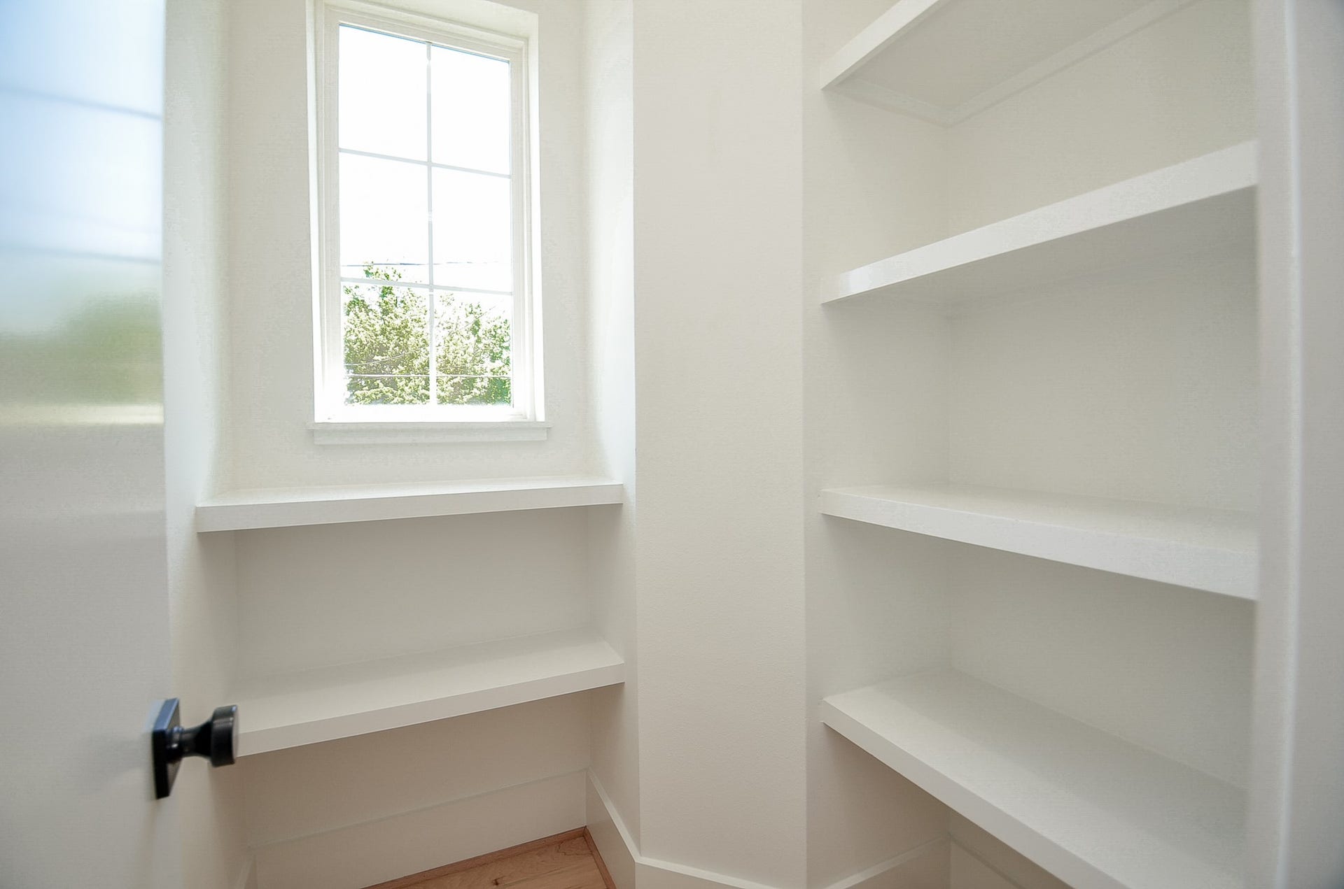 204 Burr Street, #G, Houston, TX 77011 Walk-in pantry with shelving on multiple walls.