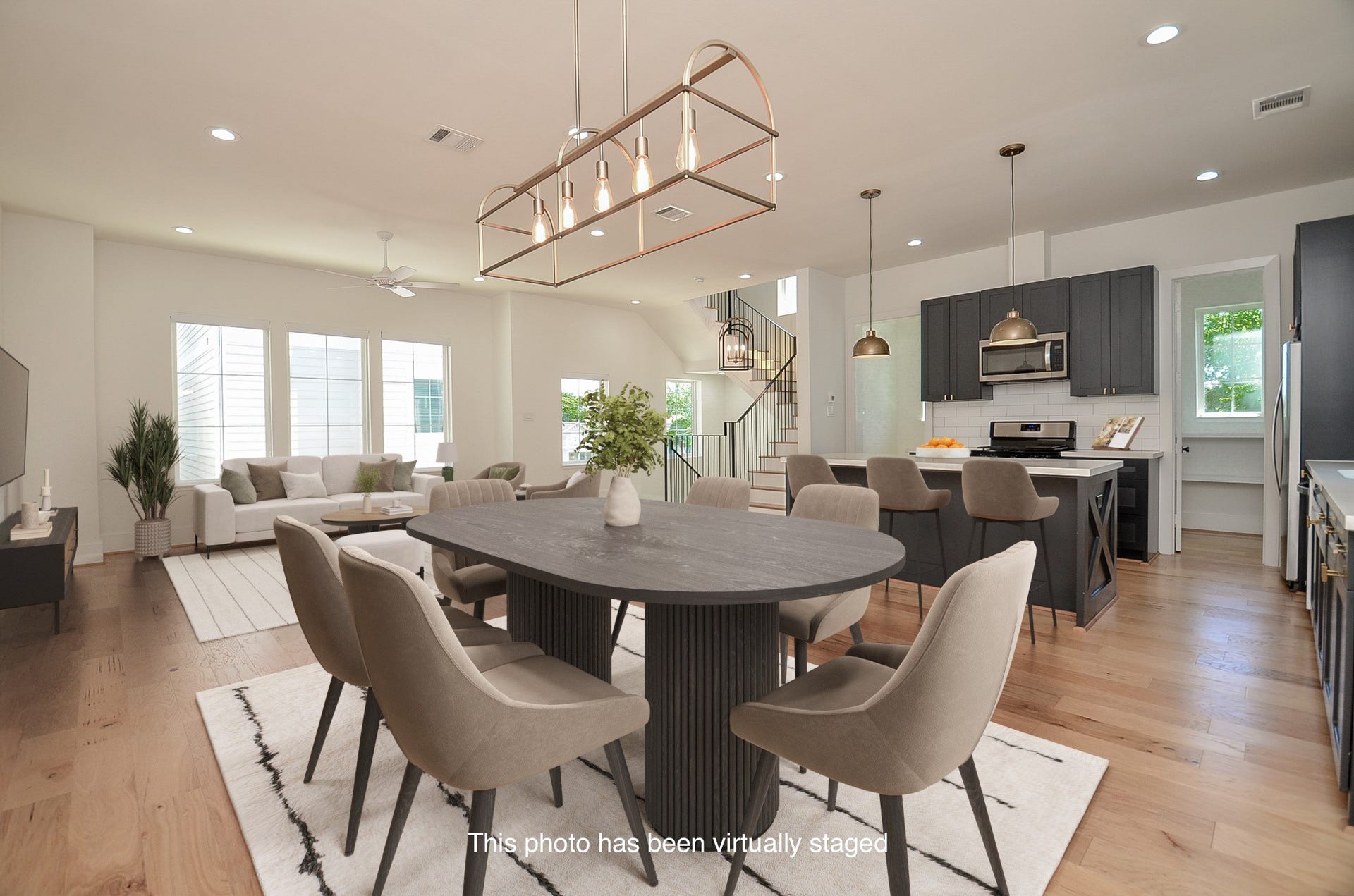 204 Burr Street, #G, Houston, TX 77011 Kitchen storage combines cabinetry, open shelving, and an adjacent walk-in pantry.