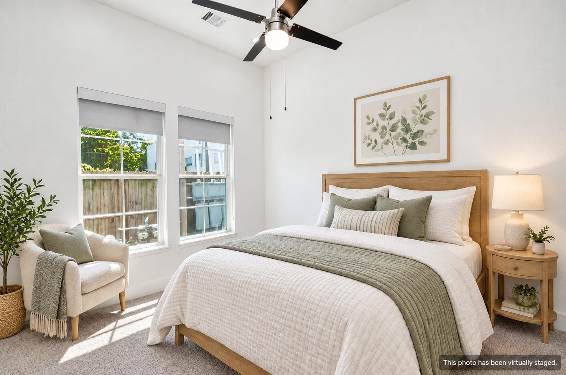 204 Burr Street, #G, Houston, TX 77011 First-floor bedroom suite, shown as a home office, offers separation from the main living level.