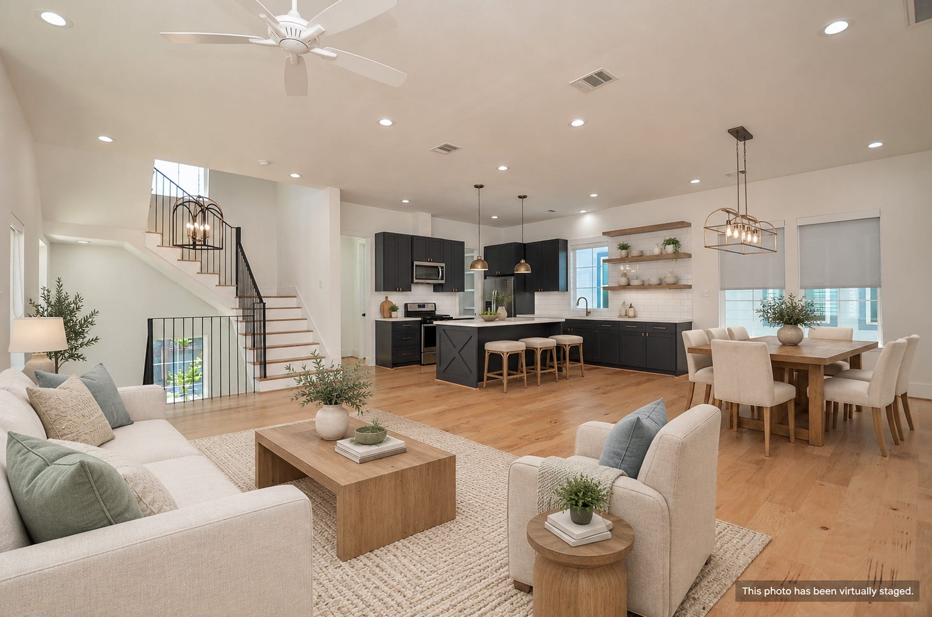204 Burr Street, #G, Houston, TX 77011 The second floor connects living, dining, and kitchen spaces in one open layout.