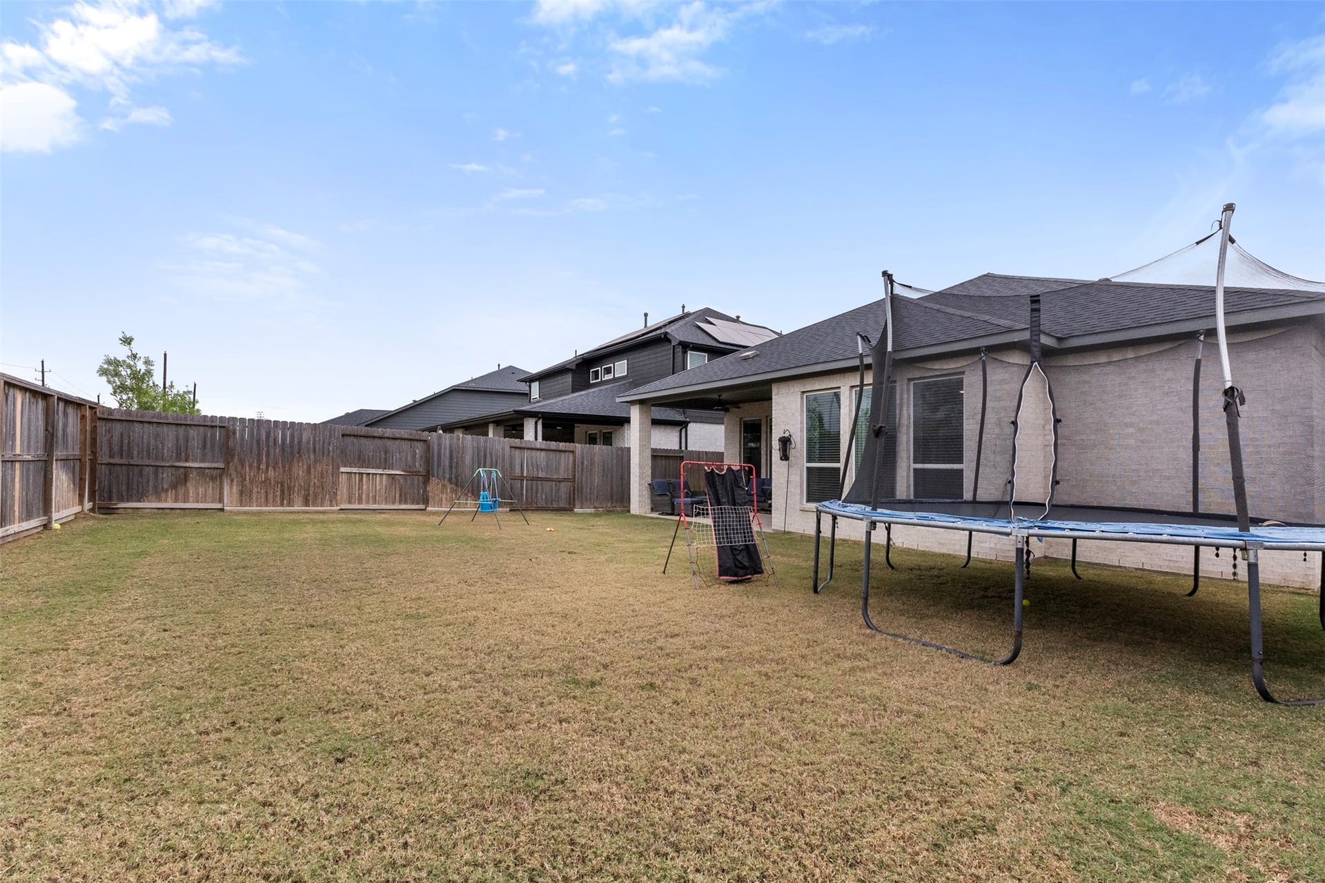 22107 Palo Dura Lane, Tomball, TX 77375 A large, fully fenced backyard with no back neighbors and a full sprinkler system.