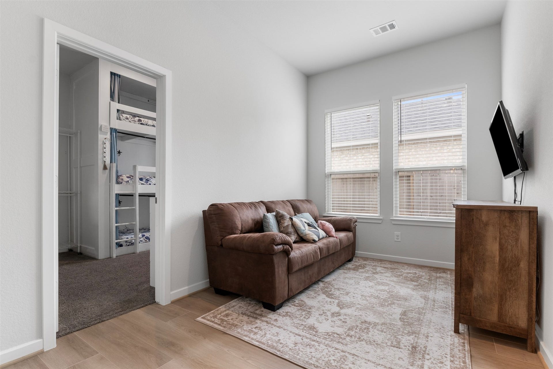 22107 Palo Dura Lane, Tomball, TX 77375 A movie night spot, a hangout zone or a quiet reading nook: this flexible game room is adaptable.