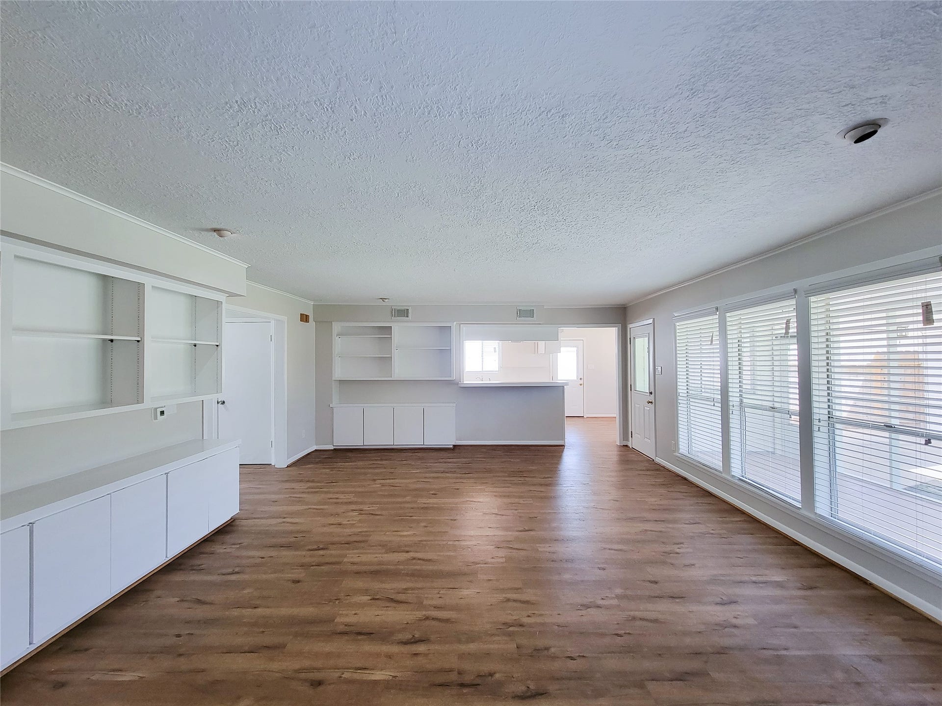 18583 Martinique Drive, Nassau Bay, TX 77058 Fresh new paint, walls of windows overlook covered outdoor porch