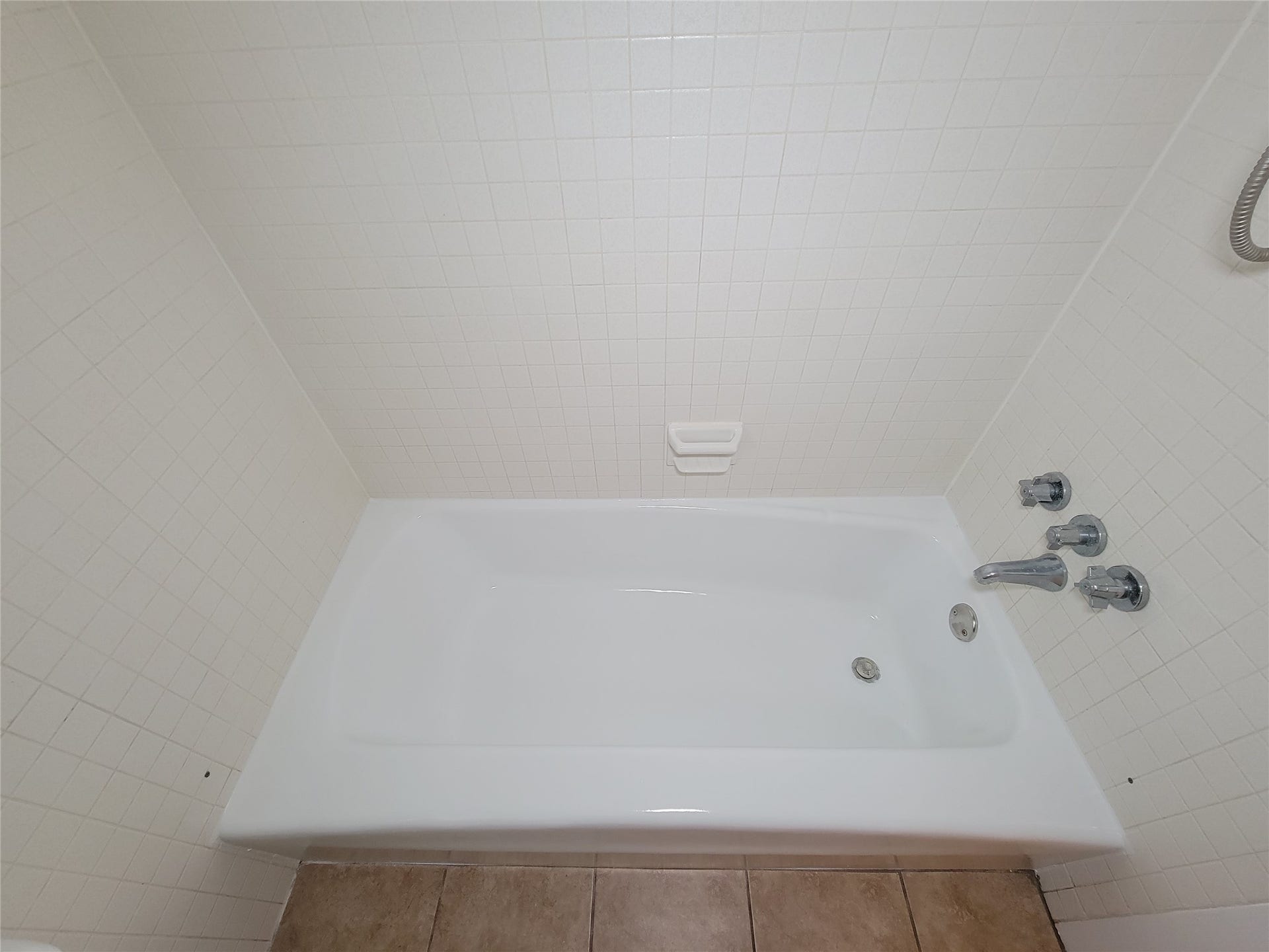 18583 Martinique Drive, Nassau Bay, TX 77058 Refinished tub in downstairs secondary bathroom