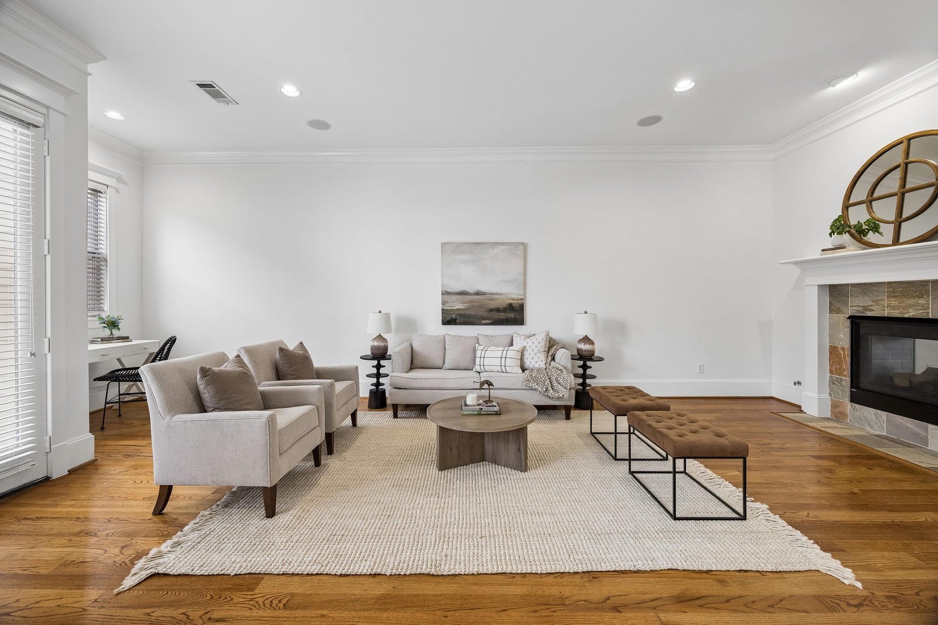 916 Lawrence Street, #A, Houston, TX 77008 Enjoy the light-filled living room space that centers around a double-sided fireplace that flows into the living room and kitchen.