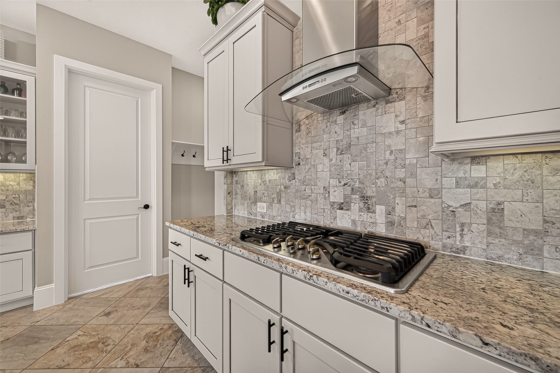 17811 Riata Prairie Lane, Cypress, TX 77433 Amazing Chefs Kitchen with granite countertops, SS Appliances, Double Oven, Walk-In Pantry and Large Island overlooking Breakfast nook and Lake