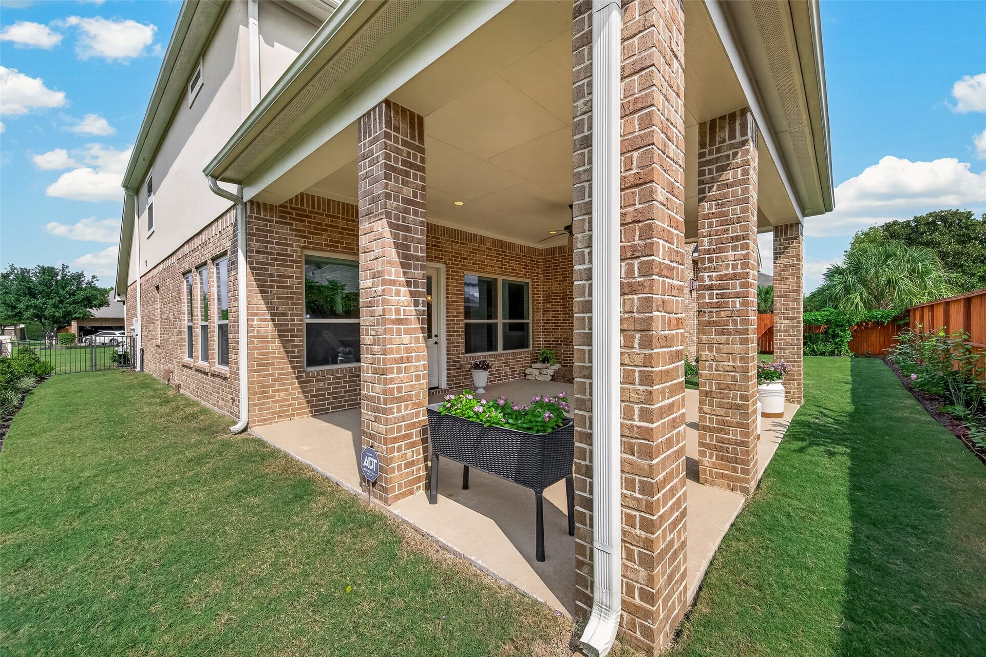 17811 Riata Prairie Lane, Cypress, TX 77433 Covered Back Patio with lush landscaping, gas hookup ready for outdoor kitchen
