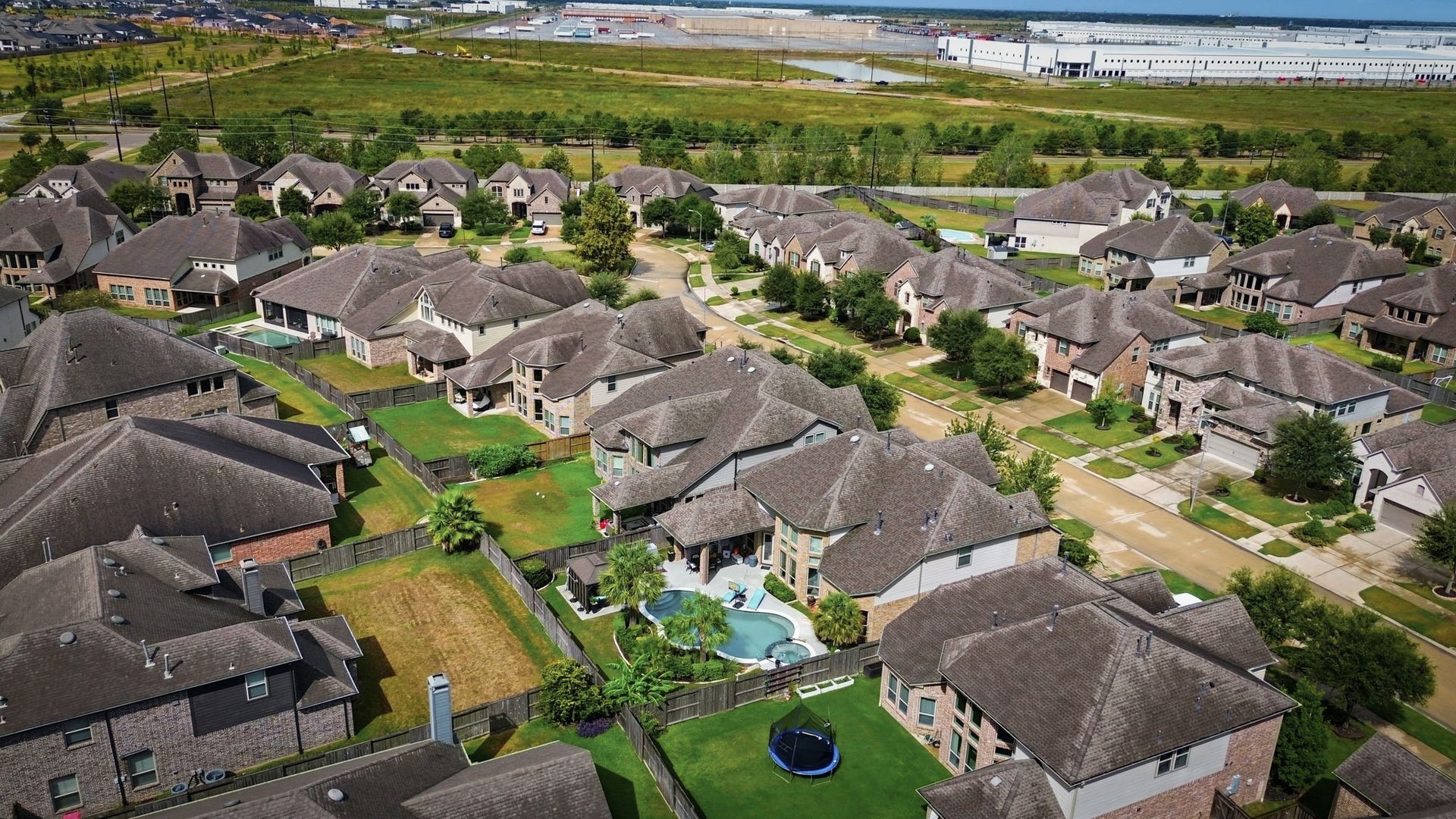 30719 Barred Owl Way, Fulshear, TX 77423 Enjoy a birds-eye view of this exceptional home, where architectural beauty and a welcoming neighborhood setting come together.