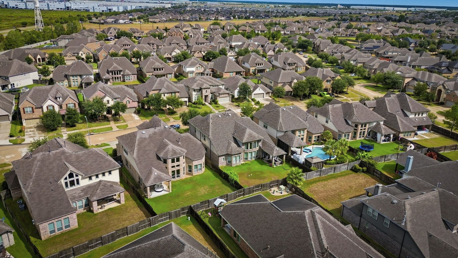 30719 Barred Owl Way, Fulshear, TX 77423 The aerial perspective offers a wonderful look at the propertys placement within the Jordan Ranch community.