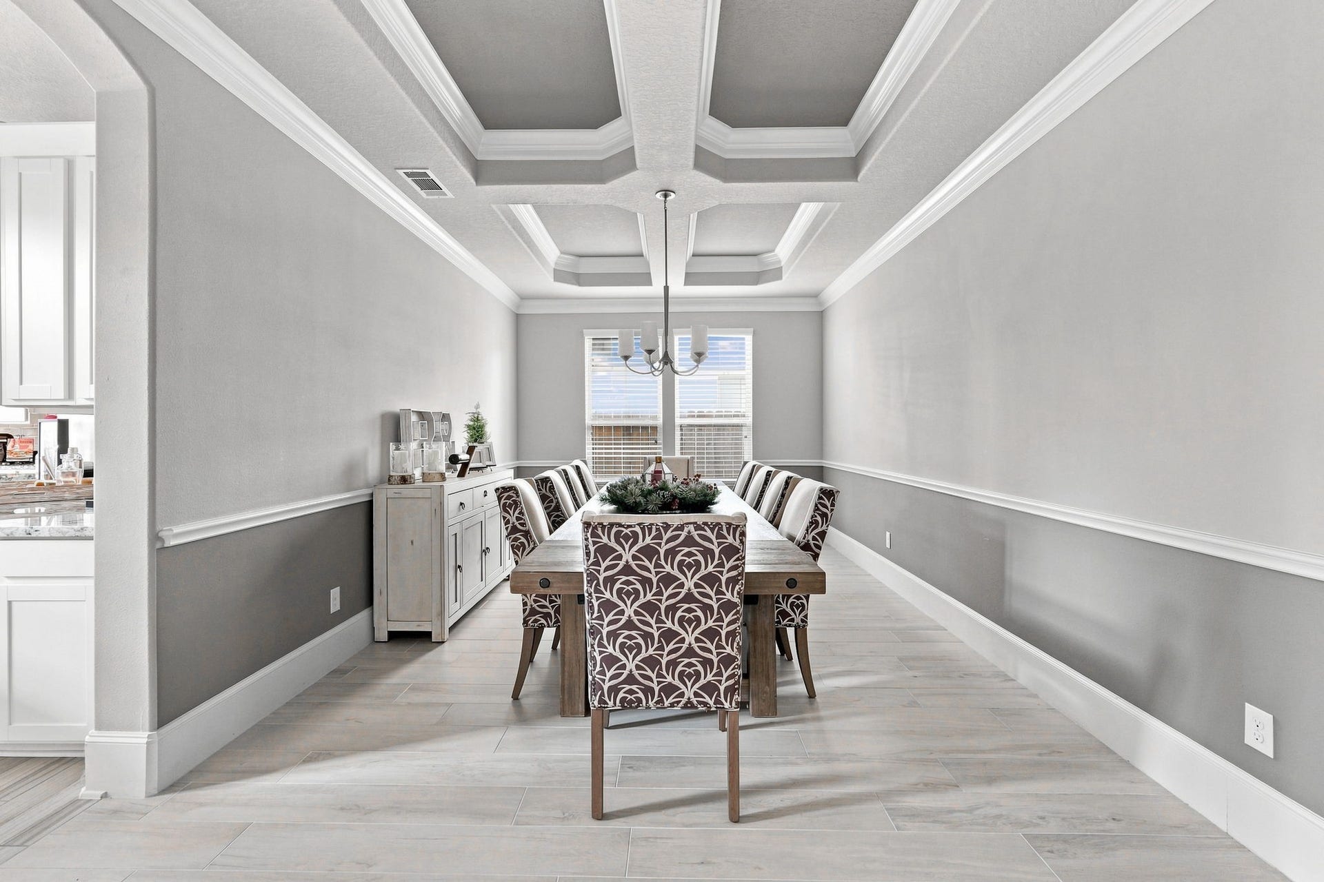 30719 Barred Owl Way, Fulshear, TX 77423 Conveniently positioned near the kitchen, this room is perfectly suited for both intimate dinners and larger celebrations.