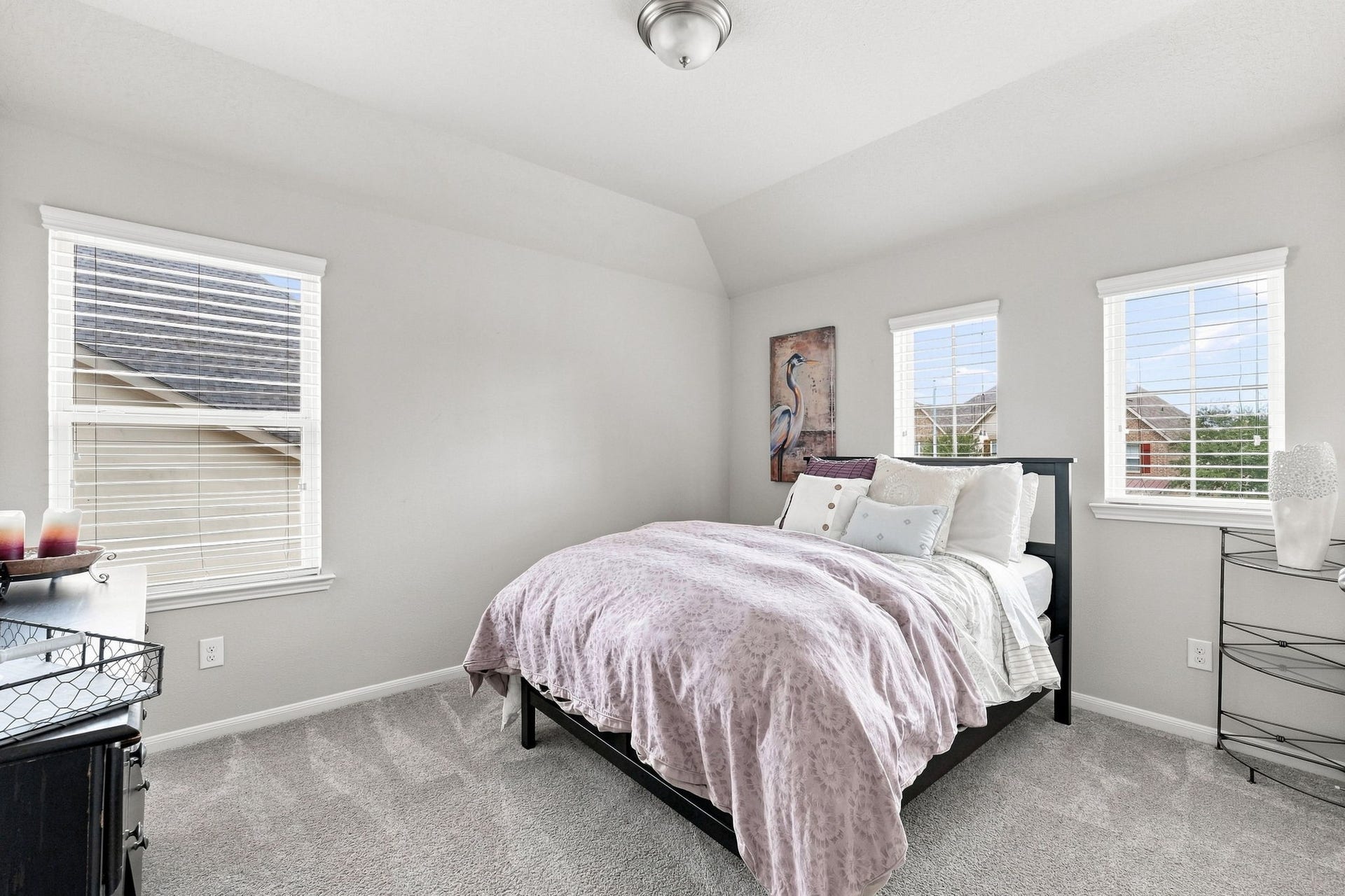 30719 Barred Owl Way, Fulshear, TX 77423 A generously sized secondary bedroom offers plenty of room for bedroom furniture and a sitting or study area.