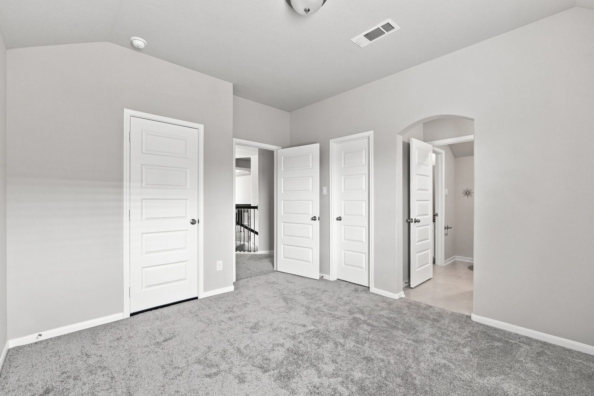 30719 Barred Owl Way, Fulshear, TX 77423 The spacious layout provides plenty of room for bedroom furniture and additional seating or a study area.