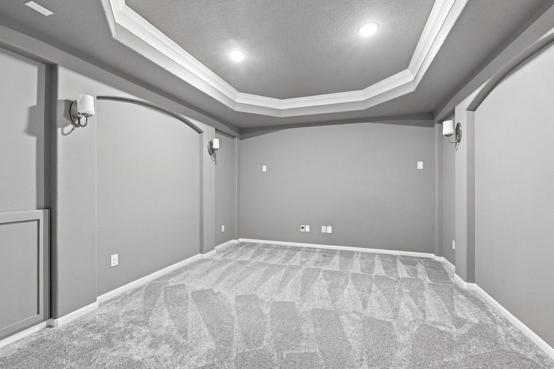 30719 Barred Owl Way, Fulshear, TX 77423 A dedicated media room offers the perfect setting for movie nights, sporting events, and entertainment.