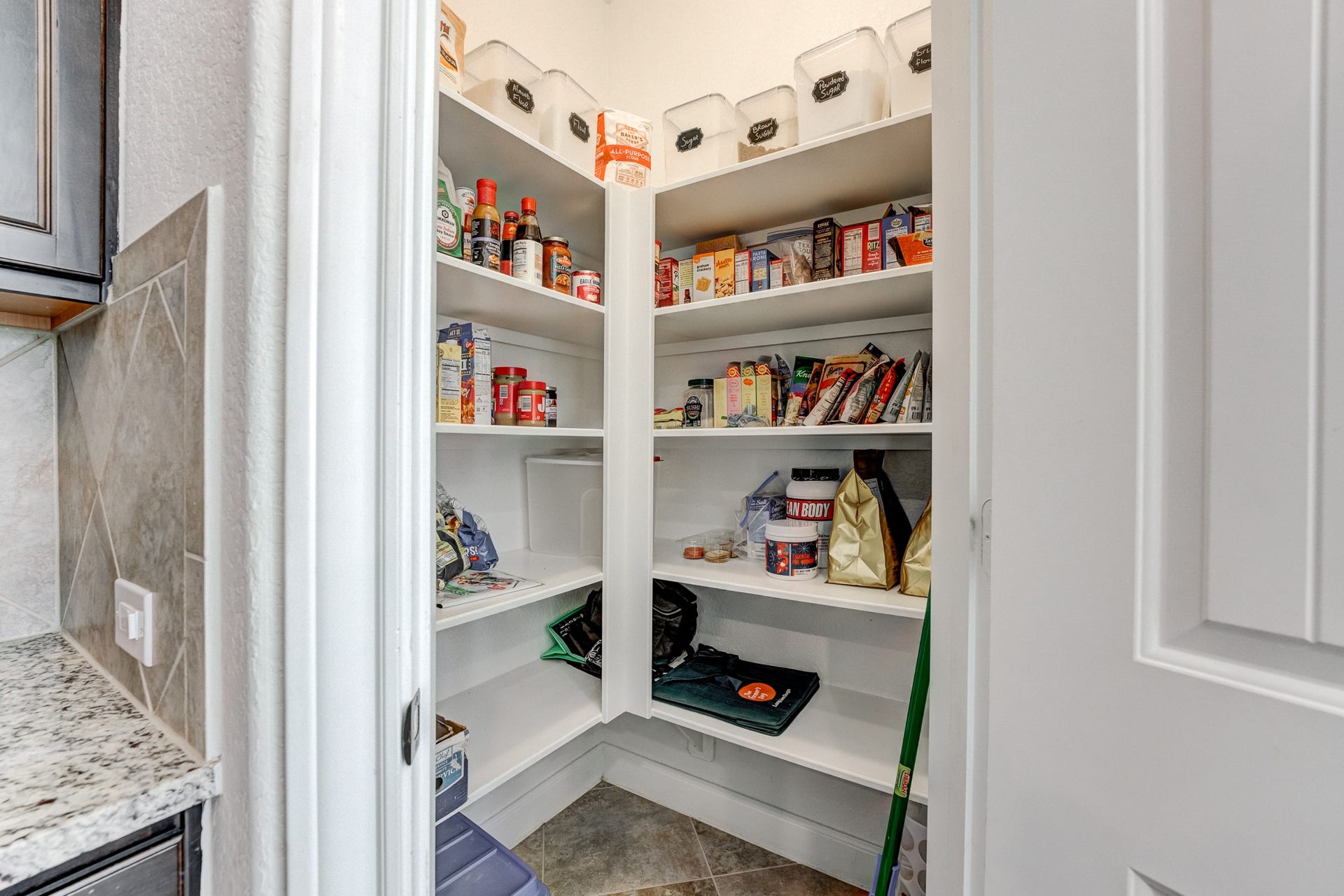 13502 Sorghum Drive, Rosharon, TX 77583 Walk-in pantry with built-in storage