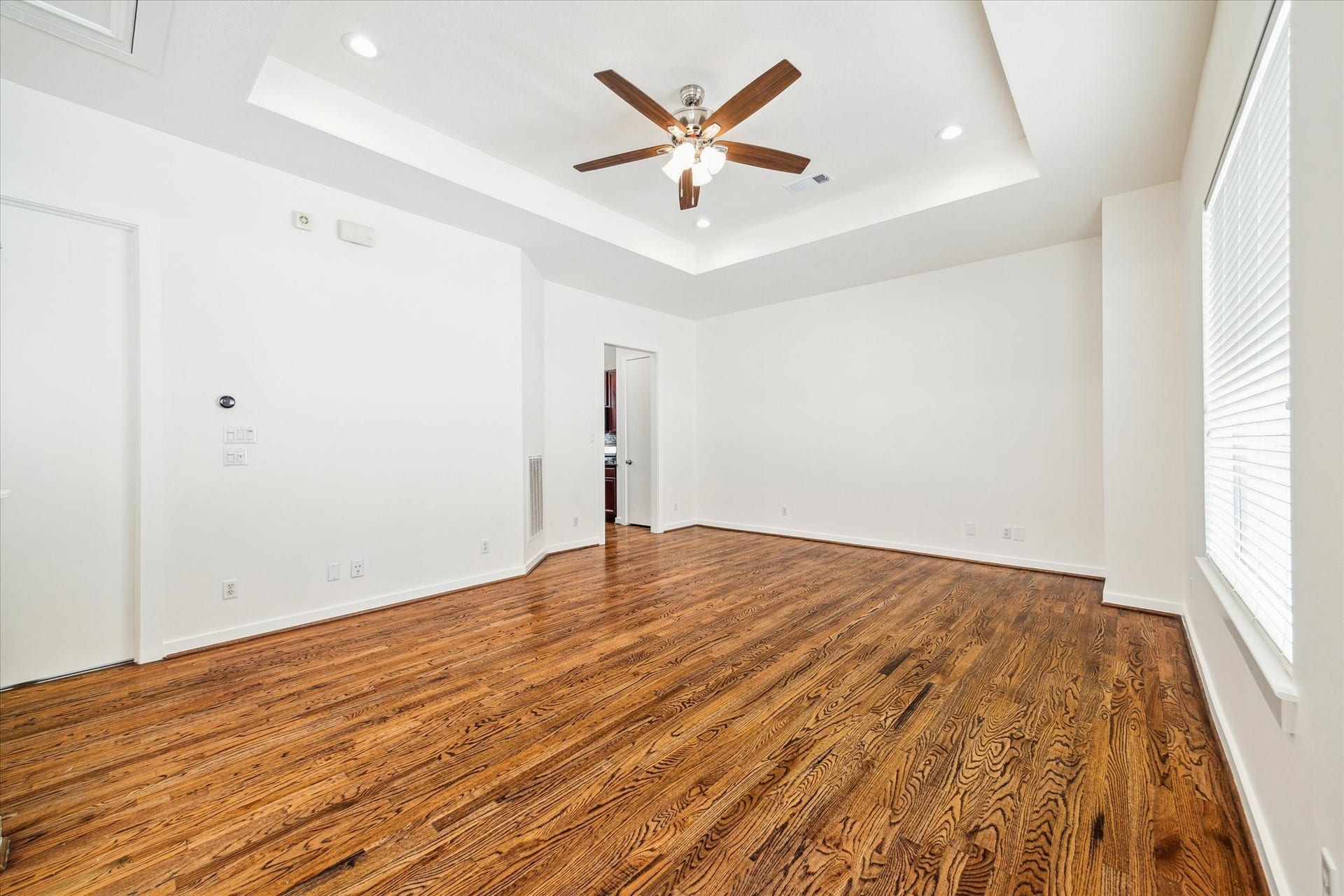 4046 Center Street, Houston, TX 77007 Another view of the living area-notice all the natural light from the huge window, plus ample, new LED recessed lights throughout.