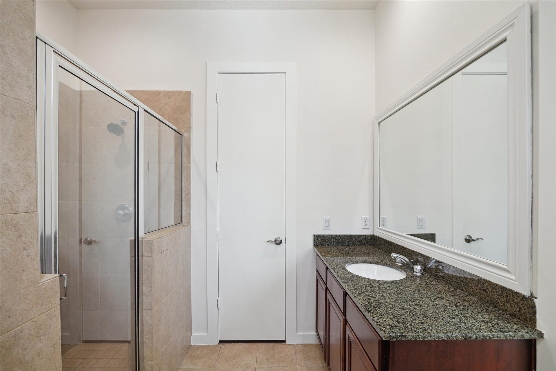 4046 Center Street, Houston, TX 77007 Walk in shower with 2 updated showerheads and new shower tile floor, plus the door ahead leads to the second closet.