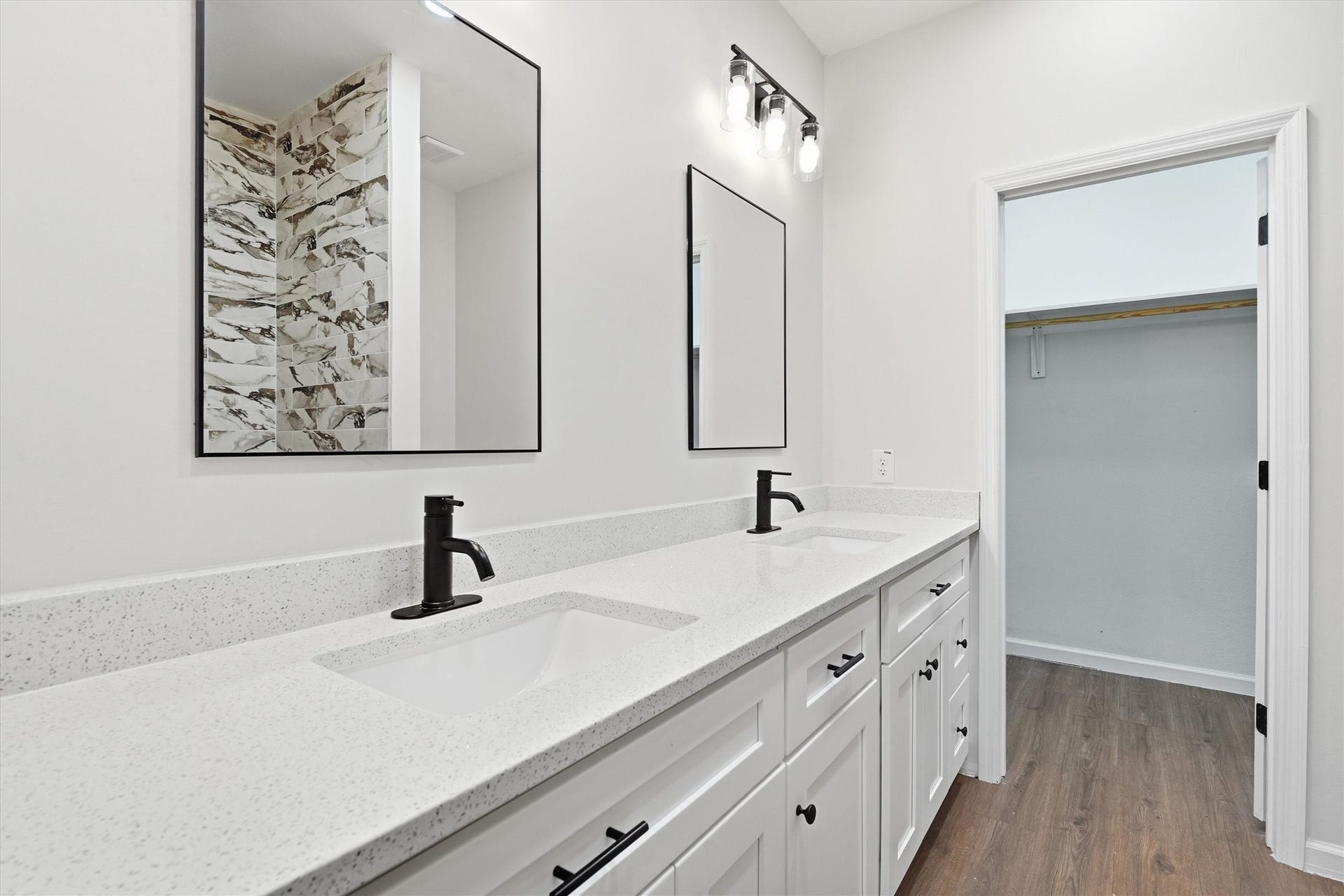 6109 Woodrow Street, Texas City, TX 77591 En suite featuring double sinks, modern mirrors and lots of counter space