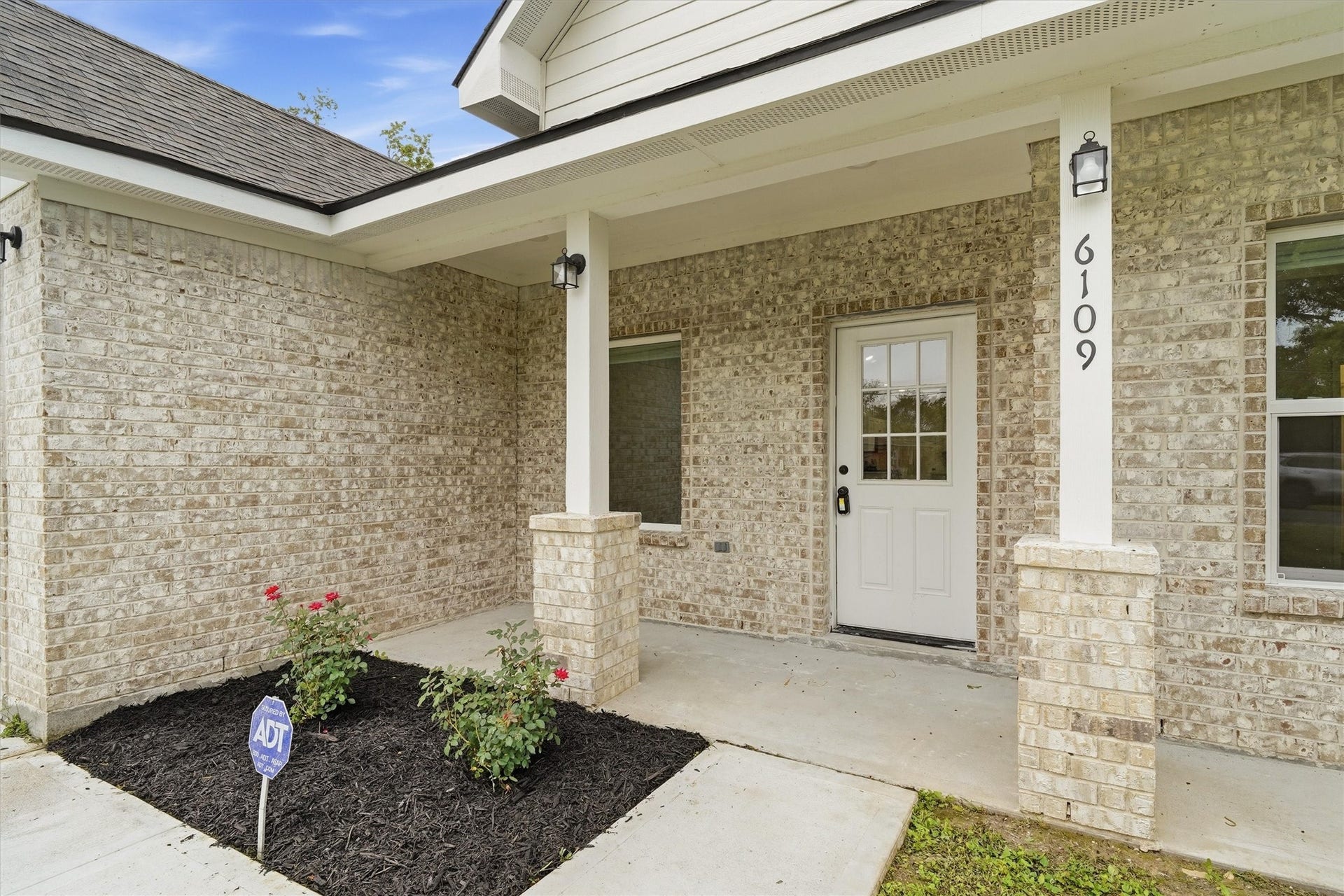 6109 Woodrow Street, Texas City, TX 77591 Fresh landscaping, covered front porch
