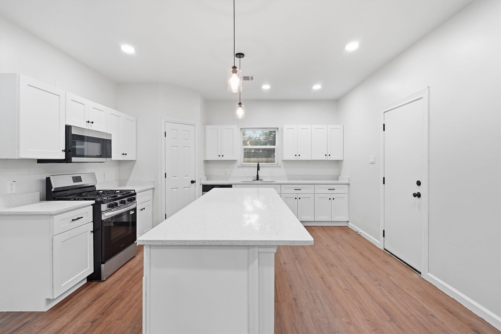 6109 Woodrow Street, Texas City, TX 77591 Texas sized island offers additional counter and storage space