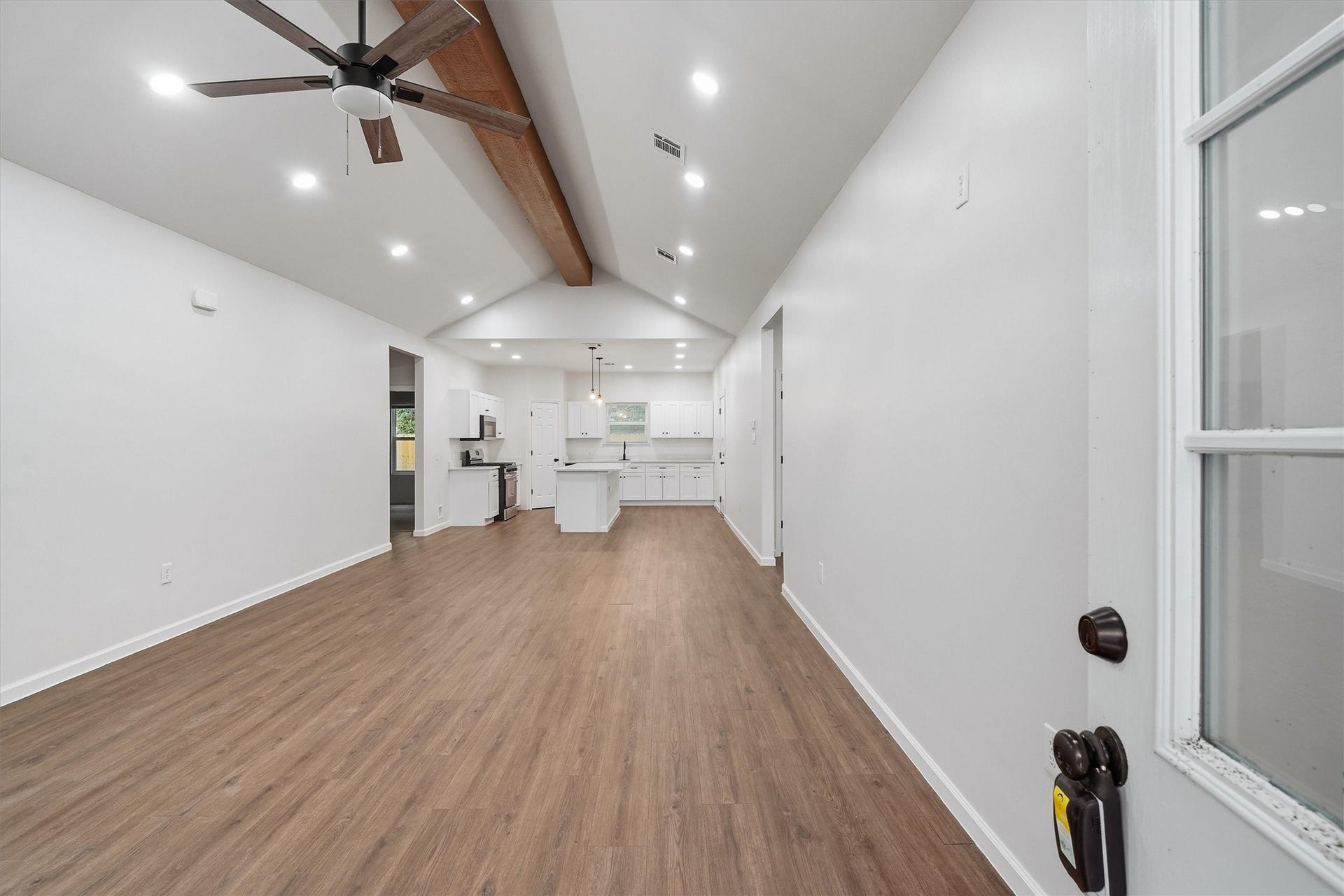 6109 Woodrow Street, Texas City, TX 77591 Like new! Fresh paint, modern flooring and exposed beam