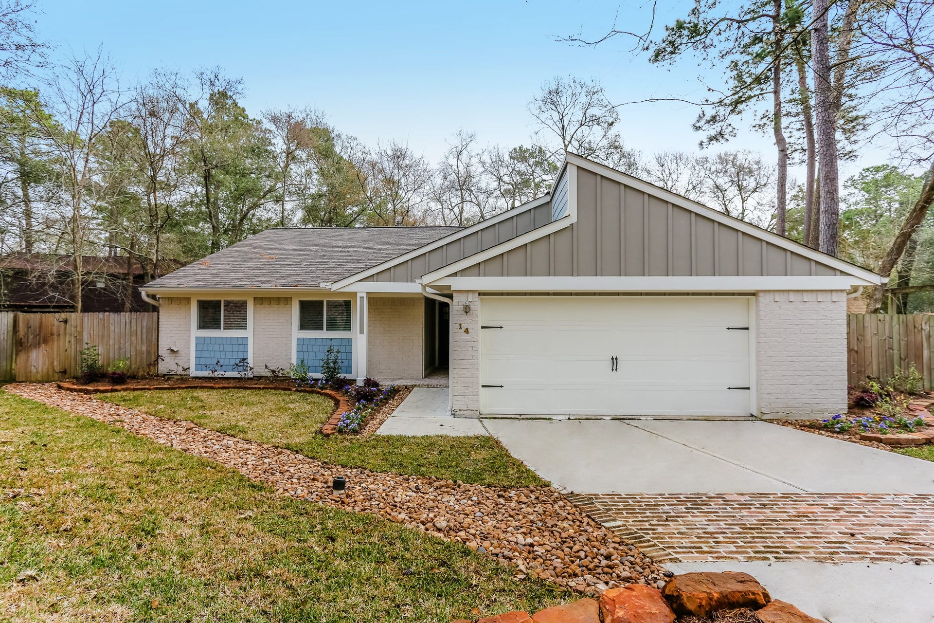 14 Woodlot Court, The Woodlands, TX 77380 Charming one-story home situated on a spacious lot in the established Grogans Mill community.
