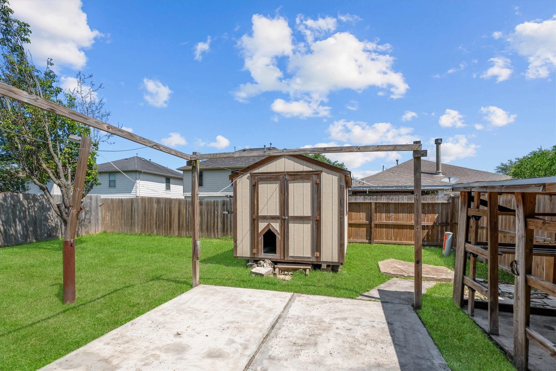5918 Stirring Winds Lane, Houston, TX 77086 Storage shed adds extra space for tools, equipment, seasonal dcor, or hobby supplies.