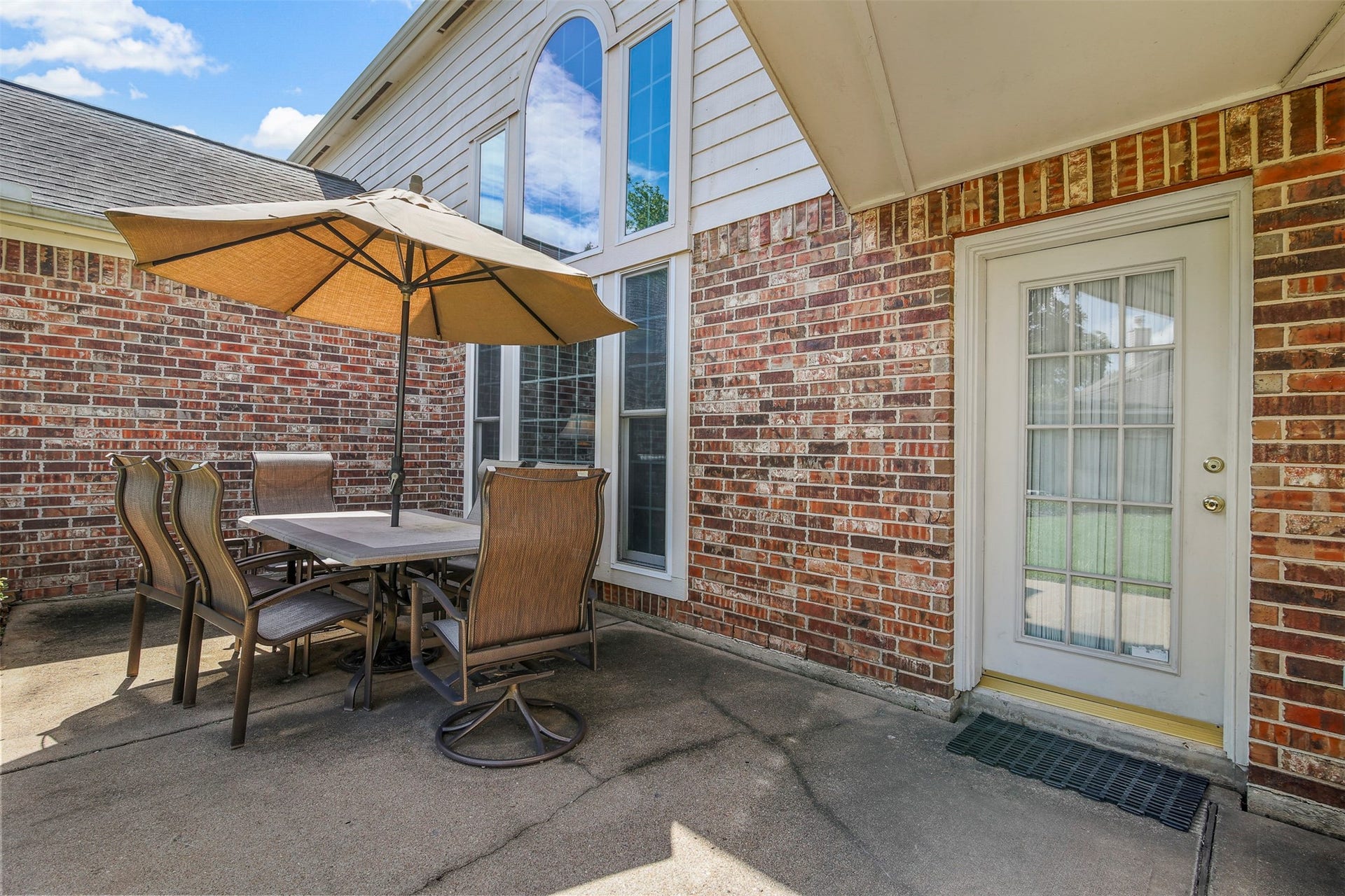 1414 Forest Bend, Sugar Land, TX 77479 Backyard has a spacious patio area perfect for outdoor entertaining.