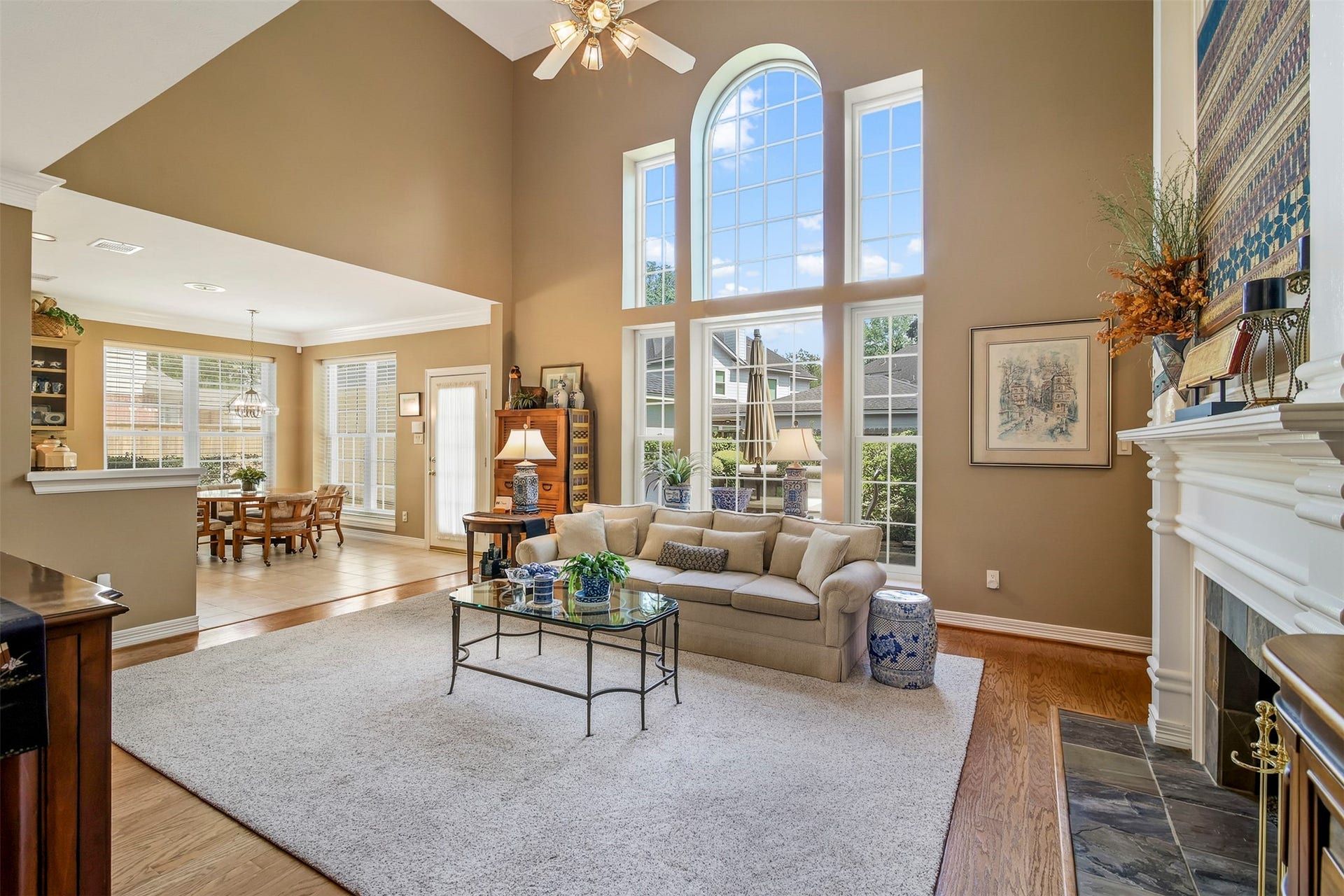 1414 Forest Bend Drive, Sugar Land, TX 77479 Another view of the family room with two story windows for an abundance of natural light.