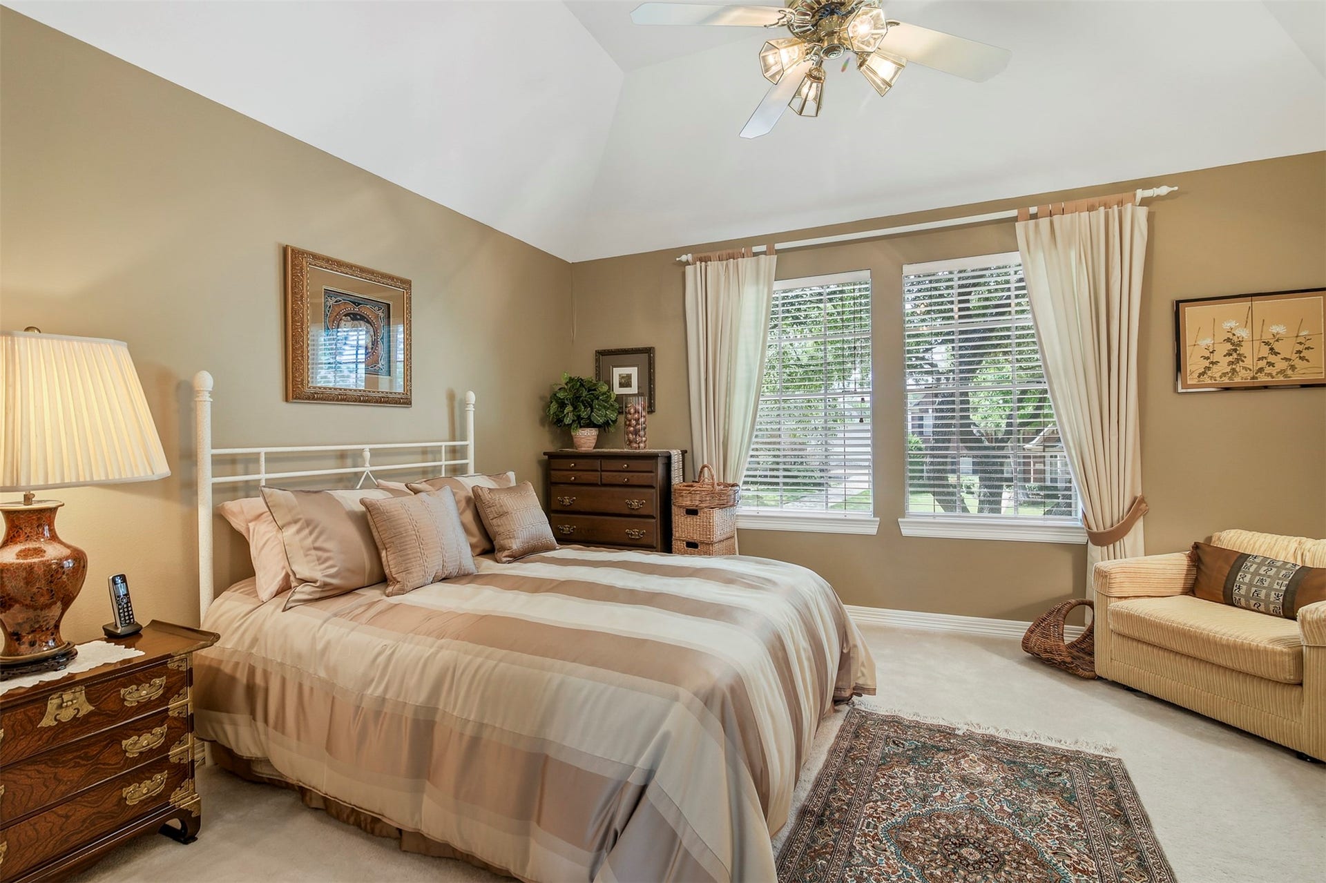 1414 Forest Bend, Sugar Land, TX 77479 Spacious secondary bedroom upstairs features carpet, large picture windows and ceiling fan.