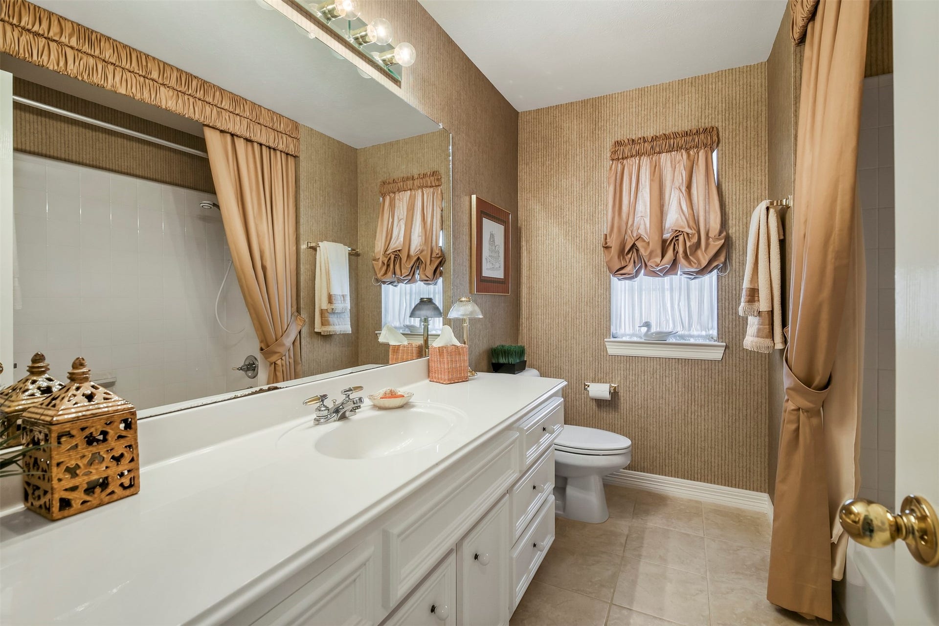 1414 Forest Bend, Sugar Land, TX 77479 Another secondary full bathroom upstairs with single sink and tub/shower combo.