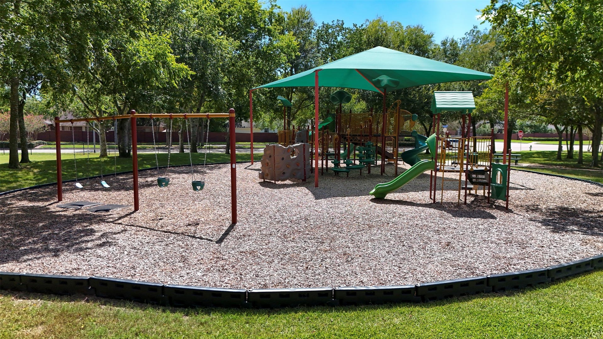 1414 Forest Bend, Sugar Land, TX 77479 Neighborhood playground with shade covering.